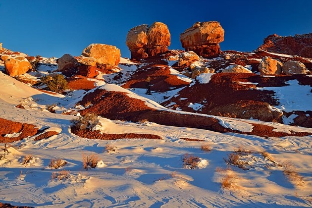 Recent snow in the high desert featuring Twin Rocks, Capitol Reef National Park, Utah, USA